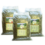 Load image into Gallery viewer, Three bags of hay with bunny brand labels on a white background