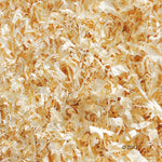 Load image into Gallery viewer, Close-up of wood shavings with a copyright notice in the corner.