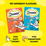 Load image into Gallery viewer, Two Dreamies cat food packages, one creamy with chicken and the other with salmon, on a yellow background.