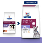 Load image into Gallery viewer, Two packages of Hills Prescription Diet i/d Digestive Care dog food on a white background