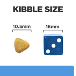 Load image into Gallery viewer, Comparison of kibble size to a blue die showing measurements.