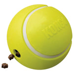 Load image into Gallery viewer, Yellow tennis ball with a hole containing treats on a white background