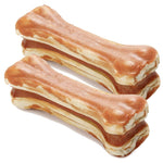 Load image into Gallery viewer, Two bone-shaped dog treats on a white background