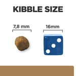 Load image into Gallery viewer, Comparison of kibble size to a blue die with measurements on a white background