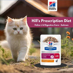 Load image into Gallery viewer, Cat walking outdoors with Hills Prescription Diet Feline i/d Digestive Care Salmon packaging.