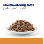 Load image into Gallery viewer, Dog food in a bowl with text 'Mouthwatering taste pets can't resist' on a white background