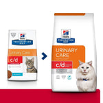 Load image into Gallery viewer, Two packages of Hill's Prescription Diet Urinary Care cat food on a white background