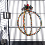 Load image into Gallery viewer, Colorful braided rope hanging toy inside a bird cage.