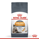 Load image into Gallery viewer, Royal Canin cat food package for hair and skin care on a white background