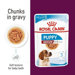 Load image into Gallery viewer, Royal Canin Puppy Medium wet dog food package with text about chunks in gravy and soft texture for baby teeth.
