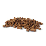 Load image into Gallery viewer, Pile of brown dog treats on a white background
