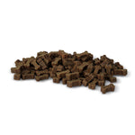 Load image into Gallery viewer, Pile of brown dog treats on a white background
