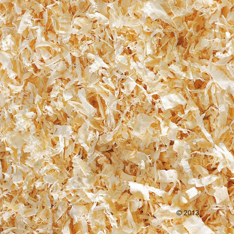 Close-up of wood shavings with a copyright notice in the corner.