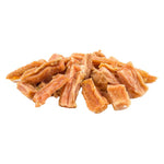 Load image into Gallery viewer, Dried dog treats on a white background
