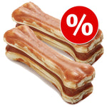 Load image into Gallery viewer, Three stacked rawhide bones with a red percentage sign icon on a white background
