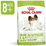 Royal Canin X-Small adult 8+ dog food package on a white background