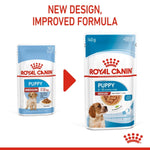 Load image into Gallery viewer, Two packages of Royal Canin Puppy Medium dog food with text about new design and improved formula.
