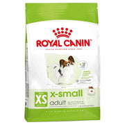 Royal Canin X-Small adult dog food packaging on a white background