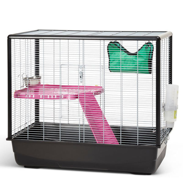 Pet cage with pink platform and green food container on a white background