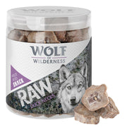 Container of Wolf of Wilderness raw duck necks snack with a wolf on the label.