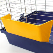 Blue and yellow pet cage with a yellow water dish on a white background