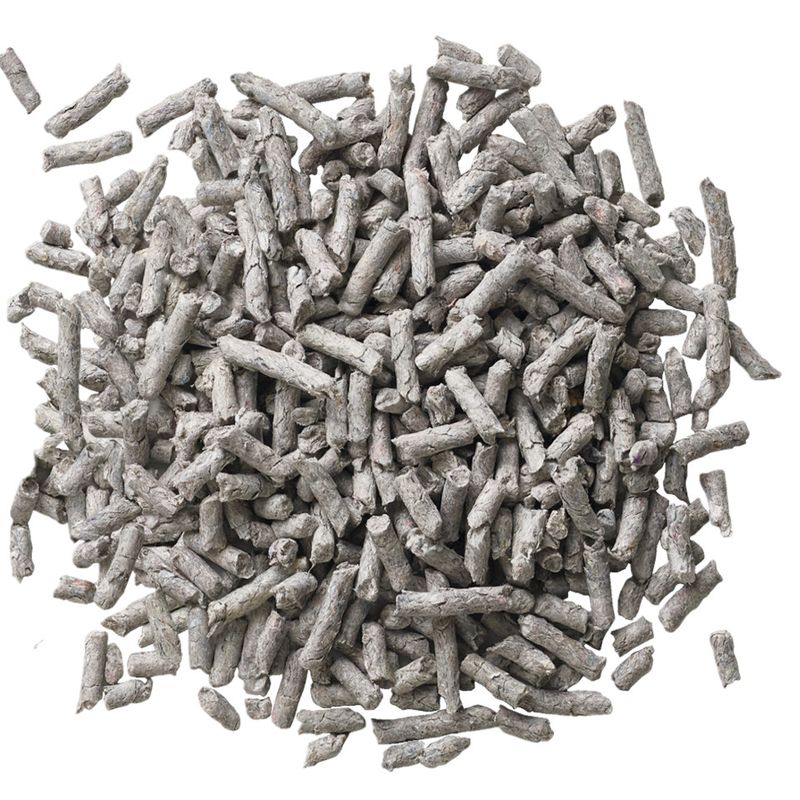Gray cylindrical pellets on a white background