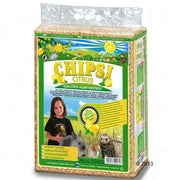 Bag of Chipsi Citrus pet bedding with a child and animals on the packaging