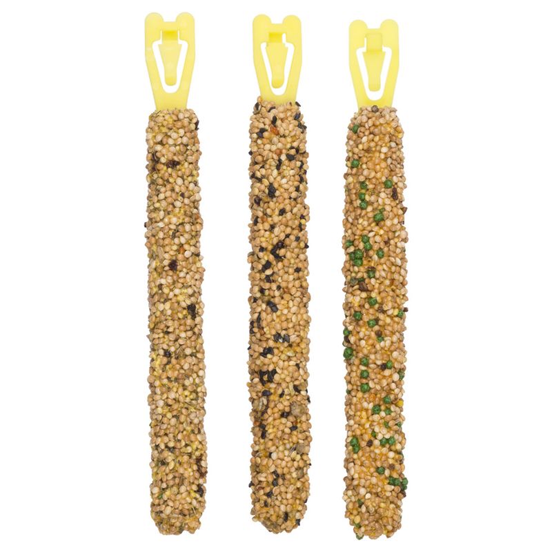 Three bird seed sticks with yellow clips on a white background