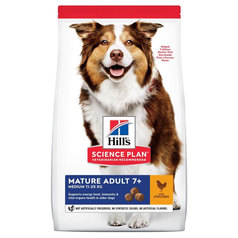 A bag of Hill's Science Plan Mature Adult 7+ Medium with Chicken dry dog food featuring an image of a smiling dog on the front.