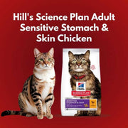 Cat next to a Hills Science Plan Adult Sensitive Stomach & Skin Chicken food package on a red background