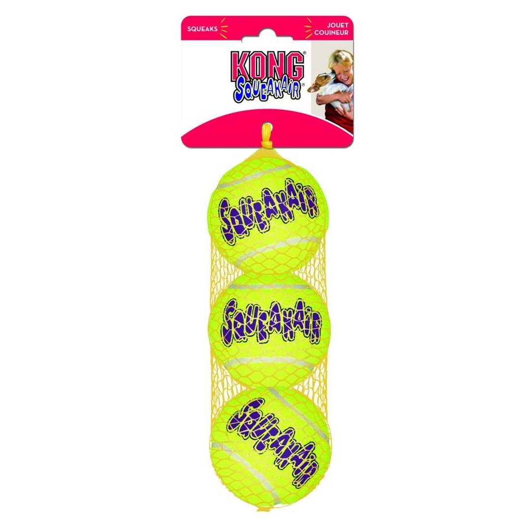 Three yellow tennis balls with 'Kong' branding in a mesh bag on a white background.