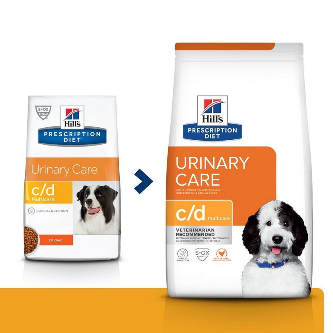Two packages of Hills Prescription Diet Urinary Care c/d multicare dog food on a white background.