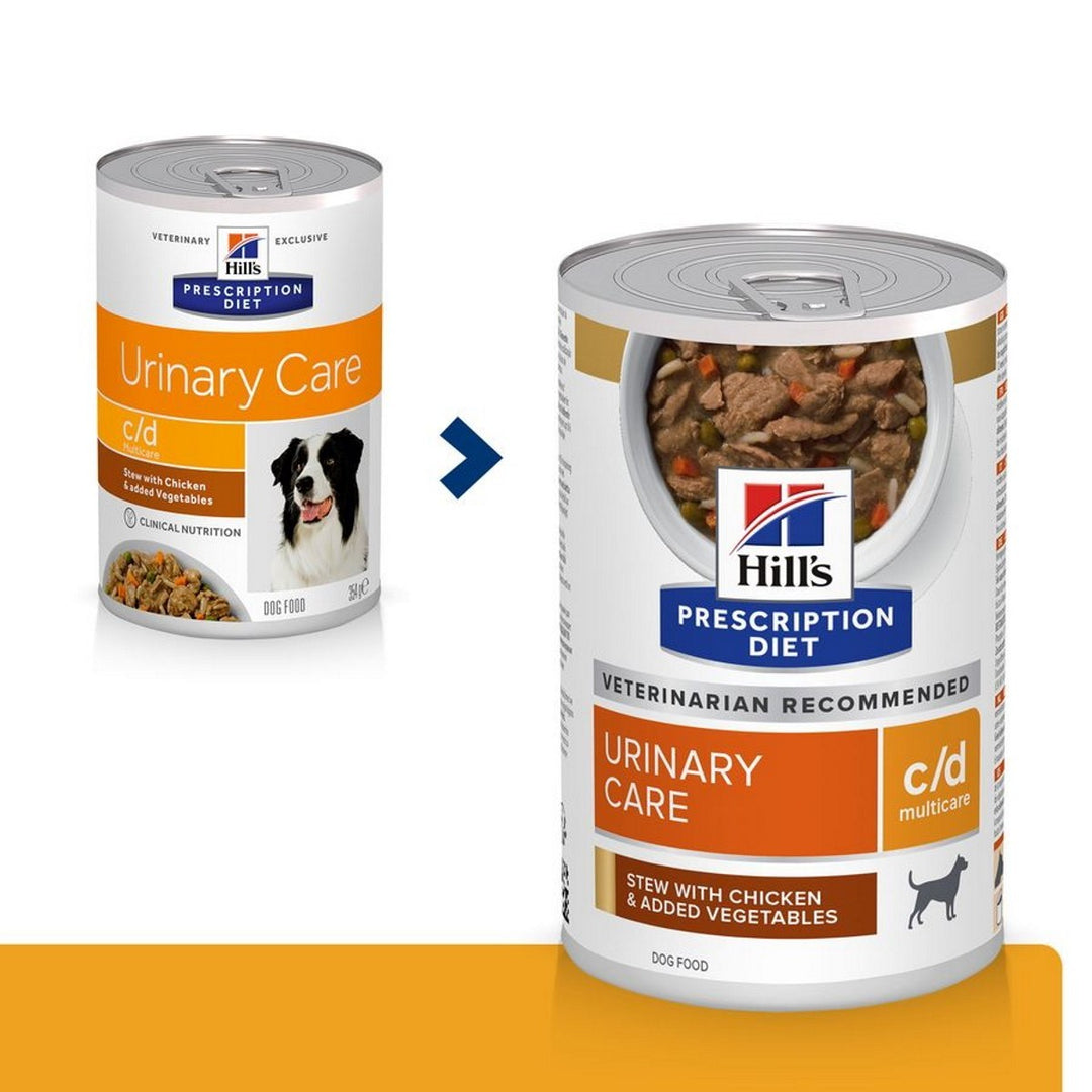 Two cans of Hill's Prescription Diet Urinary Care dog food on a white background