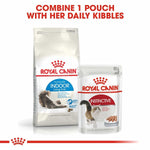 Load image into Gallery viewer, Two Royal Canin cat food packages on a white background with text.
