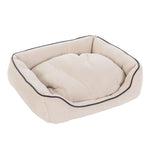 Load image into Gallery viewer, Beige pet bed with dark piping on a white background
