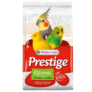 Bag of Versele-Laga Prestige Kristal bird food with colorful parakeets on a white background
